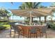 Convenient outdoor bar with seating, perfect for entertaining guests at 915 Seaside Dr # 606 Weeks 12-13, Sarasota, FL 34242