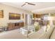 Living area with open floor plan and a large TV at 915 Seaside Dr # 607 Weeks 14-15, Sarasota, FL 34242