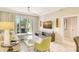 Spacious living room with comfortable seating and large TV at 915 Seaside Dr # 607 Weeks 14-15, Sarasota, FL 34242