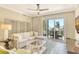 Bright living room with ocean view and comfy seating at 915 Seaside Dr # 607 Weeks 14-15, Sarasota, FL 34242