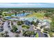 Aerial view of community clubhouse, pool, and golf course at 5519 Fair Oaks St # 2-D, Bradenton, FL 34203