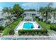 Community pool with lounge chairs and gazebo at 5519 Fair Oaks St # 2-D, Bradenton, FL 34203