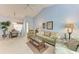 Open living space with dining and seating areas at 5519 Fair Oaks St # 2-D, Bradenton, FL 34203