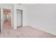 Bedroom with neutral carpet, closet, en-suite bath, and white trim at 3055 Novara Ln, Lakewood Ranch, FL 34211