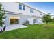 Private backyard with grassy area and patio at 3149 Novara Ln, Lakewood Ranch, FL 34211