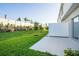 Private backyard with grassy area and patio at 3149 Novara Ln, Lakewood Ranch, FL 34211