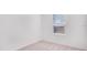Bedroom with window and neutral-colored walls at 3149 Novara Ln, Lakewood Ranch, FL 34211