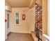 Condo building entry with stairs and fire extinguisher at 1300 N Portofino Dr # 208, Sarasota, FL 34242