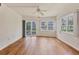 Living room with hardwood floors and abundant natural light at 1300 N Portofino Dr # 208, Sarasota, FL 34242