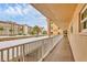 Condo hallway with access to parking and building exterior at 1300 N Portofino Dr # 208, Sarasota, FL 34242