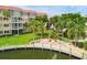Community patio area with seating and waterfront views at 1300 N Portofino Dr # 208, Sarasota, FL 34242