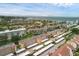 Aerial view of condos near the beach and tennis courts at 1300 N Portofino Dr # 208, Sarasota, FL 34242