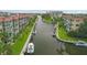 Aerial view of community with canal access and boat docks at 1300 N Portofino Dr # 208, Sarasota, FL 34242