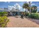 Siesta Key shops and walkways on a sunny day at 1300 N Portofino Dr # 208, Sarasota, FL 34242