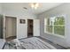Main bedroom with large window, ceiling fan and access to walk in closet at 4802 51St W St # 1305, Bradenton, FL 34210