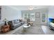 Spacious living room with hardwood floors and comfortable seating at 4802 51St W St # 1305, Bradenton, FL 34210