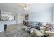 Open living room featuring hardwood floors and ample natural light at 4802 51St W St # 1305, Bradenton, FL 34210
