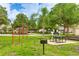 Outdoor recreation area with picnic tables, grills, and exercise equipment at 4802 51St W St # 1305, Bradenton, FL 34210