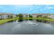 Aerial view of condo community with lake at 4802 51St W St # 1305, Bradenton, FL 34210