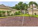 playground with swings set on a soft surface at 4802 51St W St # 1305, Bradenton, FL 34210