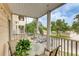 Spacious screened balcony with outdoor seating and view of the complex at 4802 51St W St # 1305, Bradenton, FL 34210