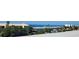 Aerial view of a beachfront property with ocean access and community at 500 Buttonwood Dr, Longboat Key, FL 34228