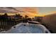 Relax in a rooftop hot tub with sunset views of the ocean and beachfront community at 500 Buttonwood Dr, Longboat Key, FL 34228