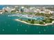 Aerial view of marina, city skyline, and waterfront at 500 Buttonwood Dr, Longboat Key, FL 34228
