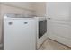 Convenient laundry area features a modern washer and dryer with easy access to the rest of the home at 11406 Belvedere Ter, Lakewood Ranch, FL 34211