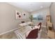 Stylish home office setup featuring contemporary decor, natural light, and comfortable seating at 11406 Belvedere Ter, Lakewood Ranch, FL 34211
