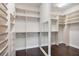 Large walk-in closet with ample shelving and hanging space at 5923 Snowy Egret Dr, Sarasota, FL 34238