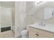 Bathroom with vanity, toilet, and tub shower combo at 5923 Snowy Egret Dr, Sarasota, FL 34238