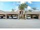 Parking area with covered spaces for residents at 811 Fairwaycove Ln # 107, Bradenton, FL 34212