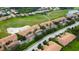 Aerial view showing condo location near golf course at 811 Fairwaycove Ln # 107, Bradenton, FL 34212
