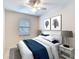 Comfortable bedroom with a queen-size bed and window coverings at 811 Fairwaycove Ln # 107, Bradenton, FL 34212