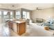 Well-equipped kitchen with island and breakfast nook at 811 Fairwaycove Ln # 107, Bradenton, FL 34212