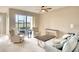 Living room with comfortable seating and golf course view at 811 Fairwaycove Ln # 107, Bradenton, FL 34212