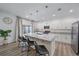 Modern kitchen with white cabinets, granite countertops and kitchen island at 1807 Robinhood St, Sarasota, FL 34231