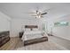 Large main bedroom with a king-size bed and ceiling fan at 1807 Robinhood St, Sarasota, FL 34231