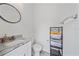 Small bathroom with single vanity, toilet and storage at 1807 Robinhood St, Sarasota, FL 34231