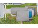 Aerial view showcasing the house, pool, and surrounding landscape at 1807 Robinhood St, Sarasota, FL 34231
