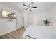 Spacious bedroom with wood-look floors and access to another bathroom at 1807 Robinhood St, Sarasota, FL 34231