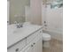 Clean bathroom with single sink vanity and a shower/tub combo at 11406 Belvedere Ter, Lakewood Ranch, FL 34211