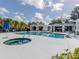 Inviting community pool with a spa and relaxing patio area at 11406 Belvedere Ter, Lakewood Ranch, FL 34211