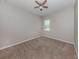 Bright bedroom with neutral walls and carpet flooring at 11406 Belvedere Ter, Lakewood Ranch, FL 34211
