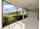 Spacious screened porch overlooking a tranquil pond at 11406 Belvedere Ter, Lakewood Ranch, FL 34211