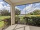 Relaxing screened porch with pond and landscape views at 11406 Belvedere Ter, Lakewood Ranch, FL 34211