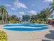 Fun playground with a blue water feature and shaded seating at 11406 Belvedere Ter, Lakewood Ranch, FL 34211