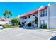 Two-story condo building with parking and landscaping at 1801 Gulf N Dr # 275, Bradenton Beach, FL 34217