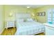 Comfortable main bedroom with king-size bed and light decor at 1801 Gulf N Dr # 275, Bradenton Beach, FL 34217